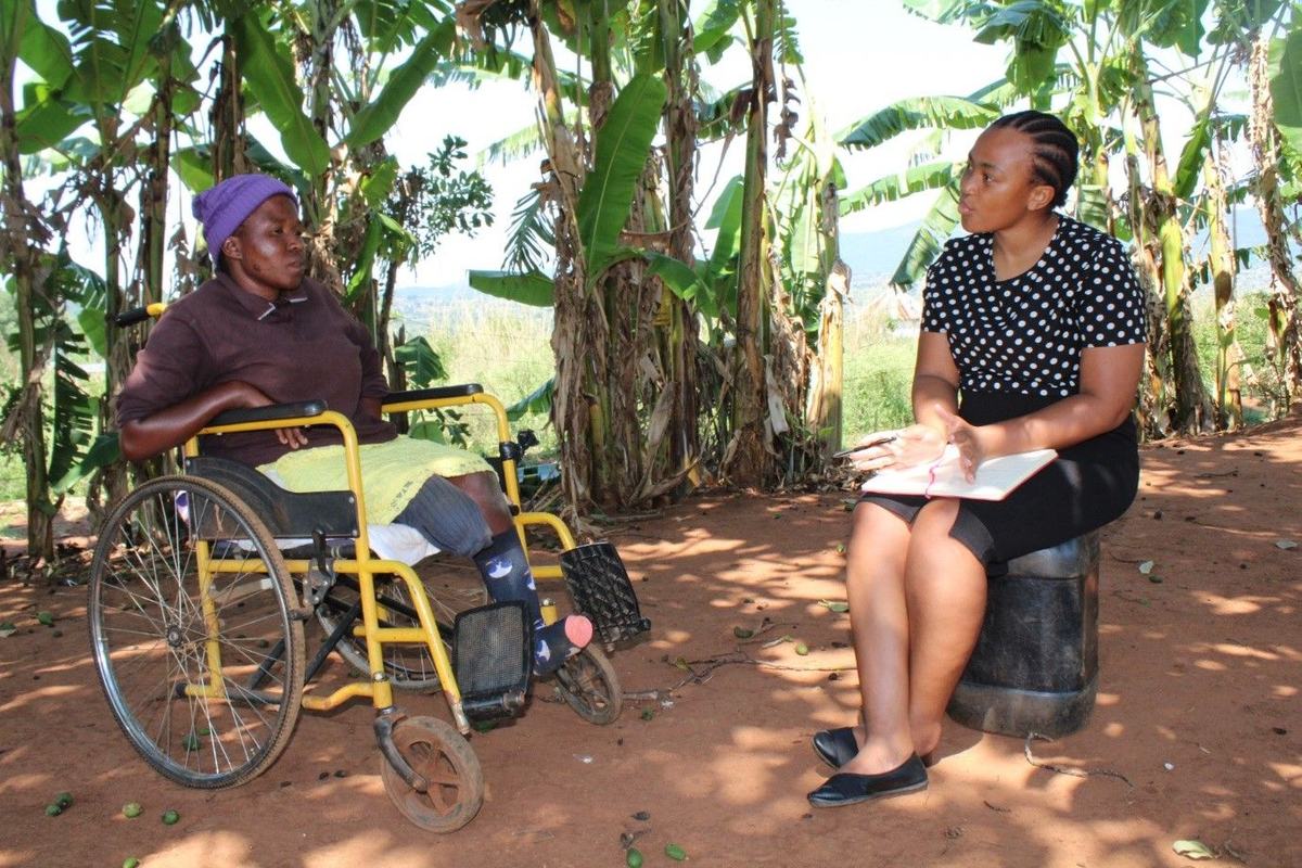 A social worker and client discuss psychological and social concerns in the Hhohho region.
