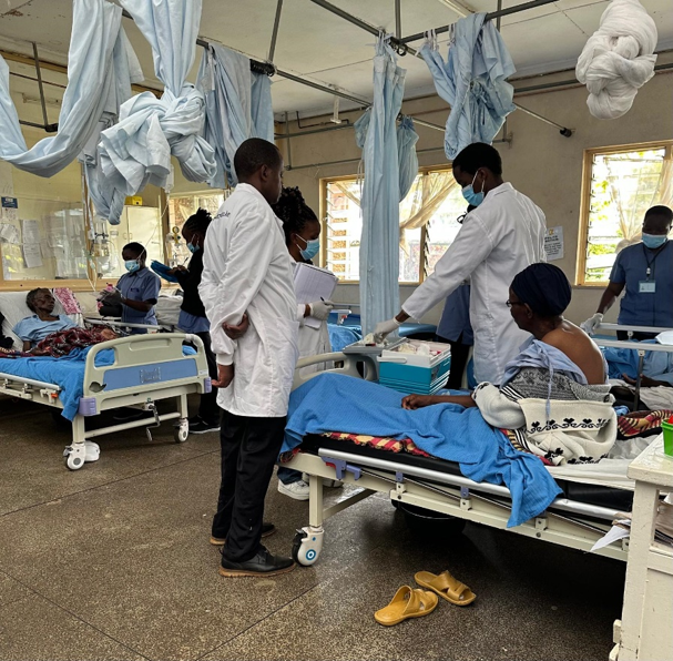 The Gold Care team in a ward with patients at Chogoria Hospital